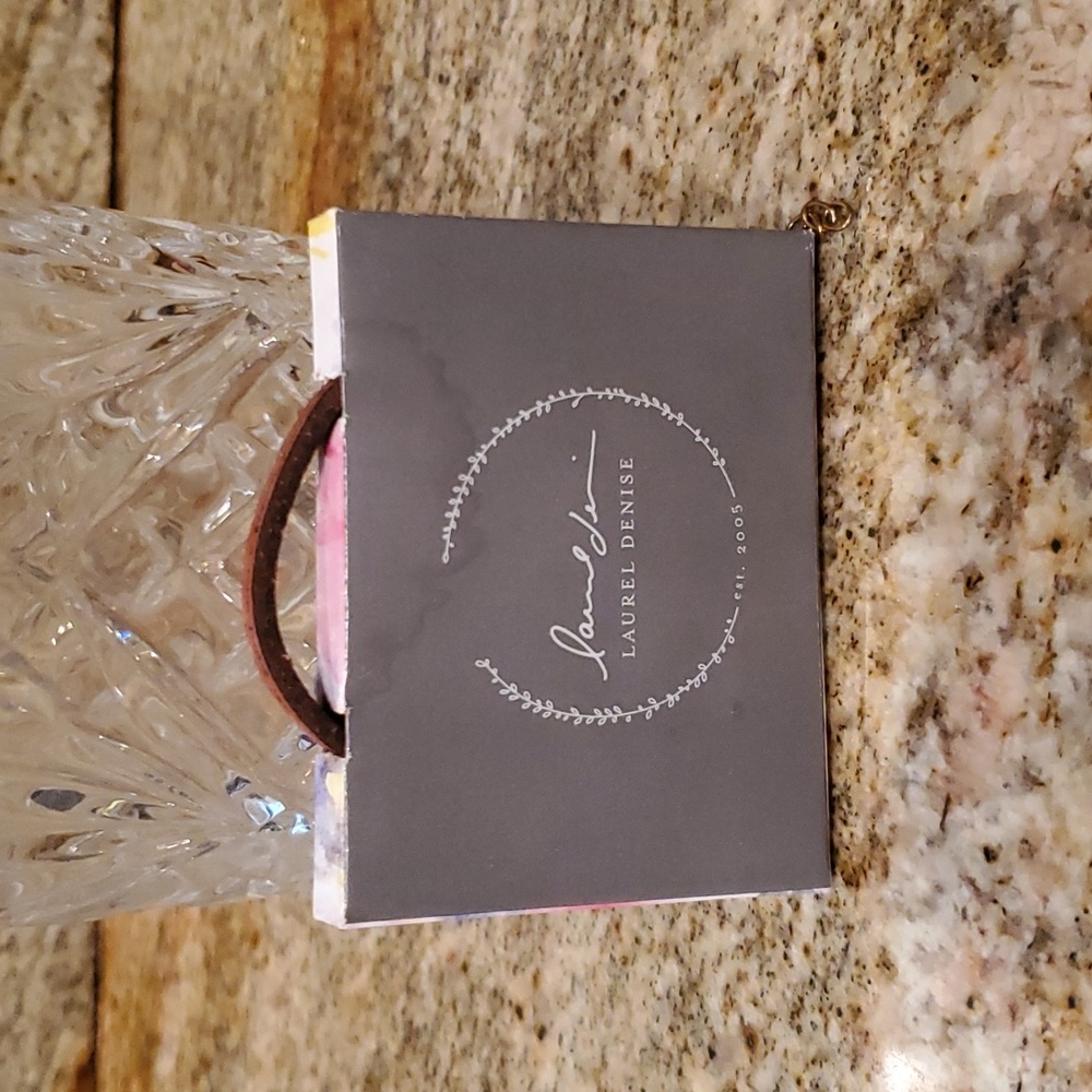 Laurel Denise leather bracelet with inscription.